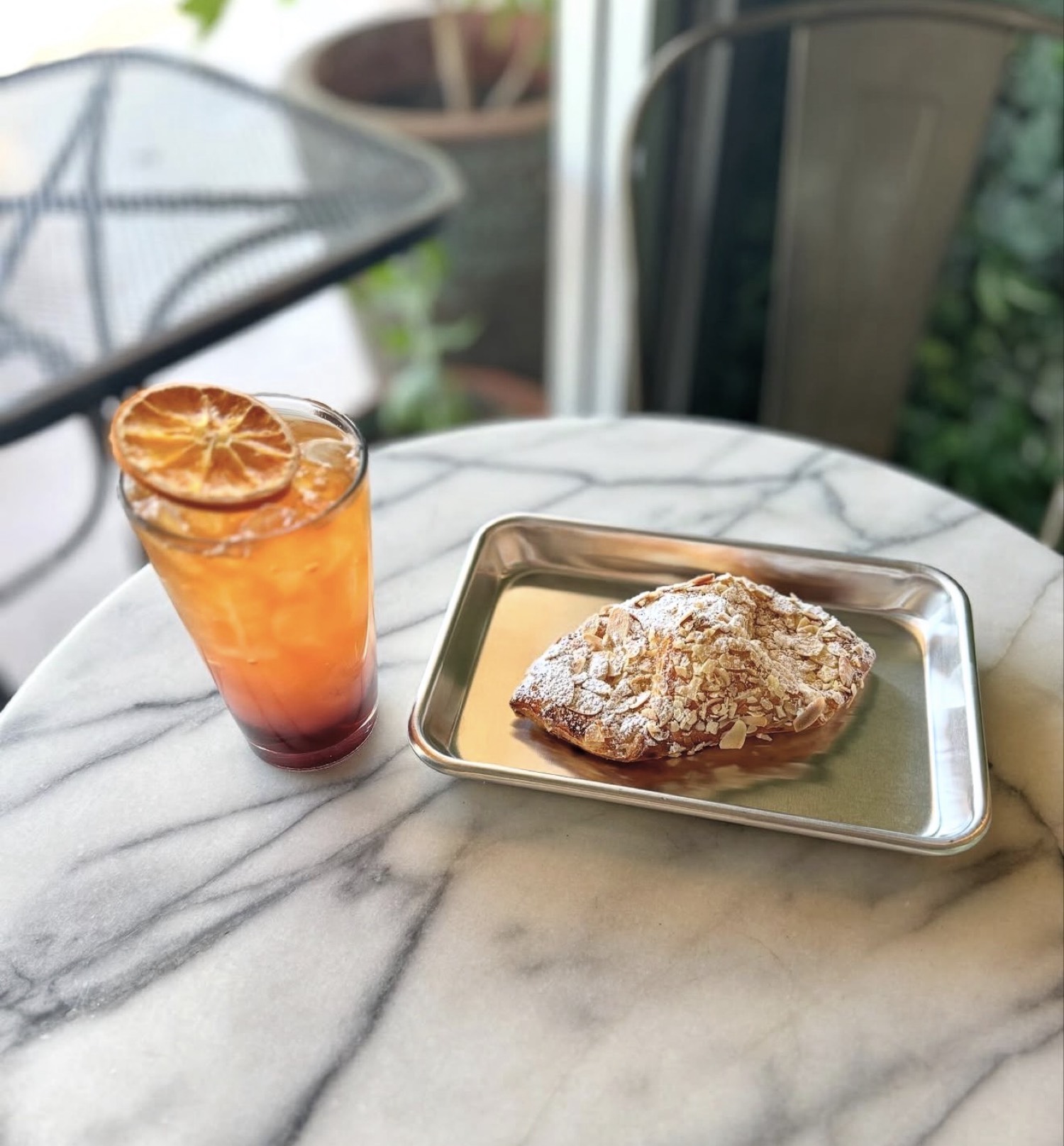 Iced drink and pastry at Venus Taproom